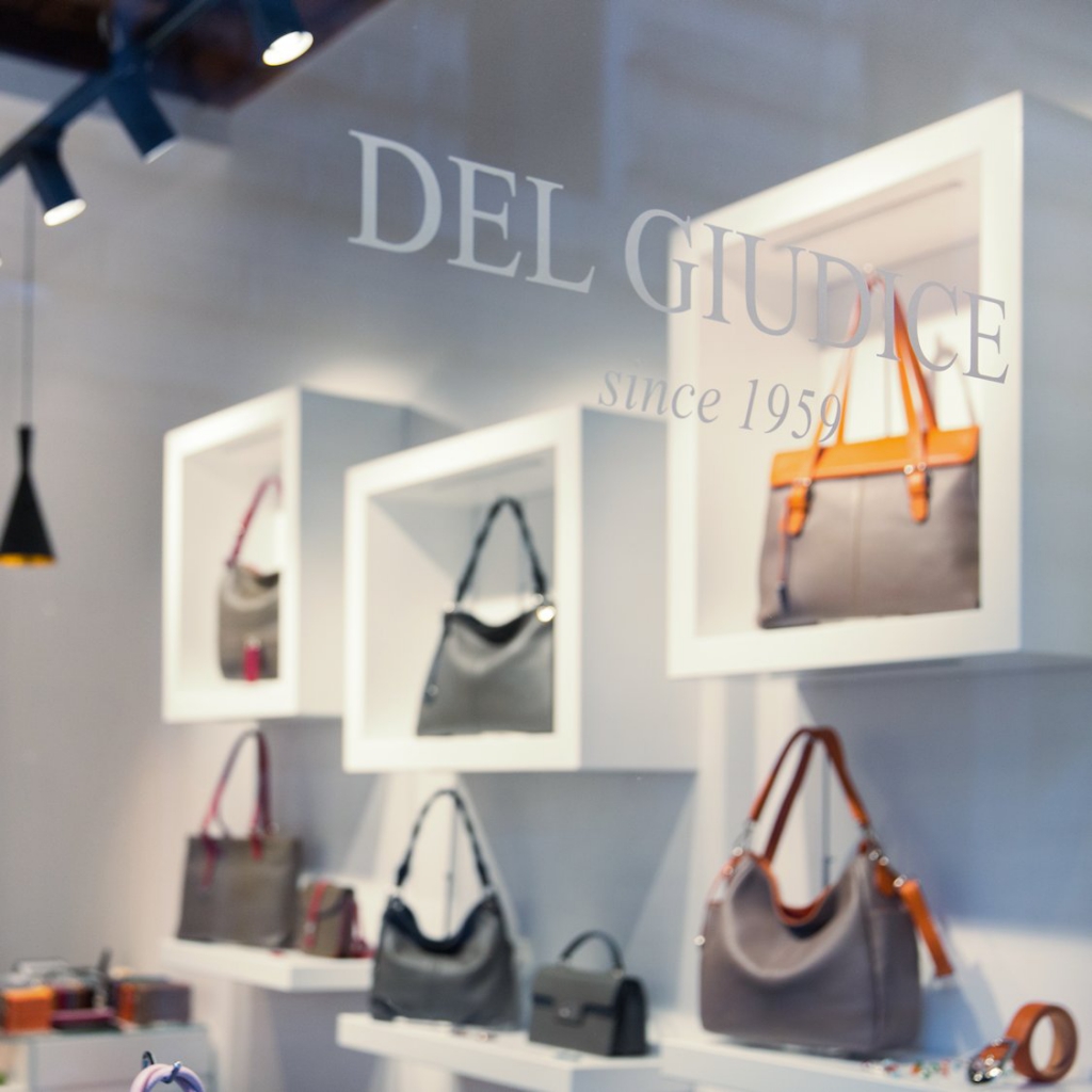 Window of our leather goods shop in Via dei Coronari, Rome