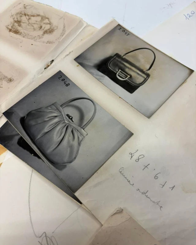 Our paper archive holds many traces of the models created in our workshop over the decades: photographs, original sketches, handwritten notes and old catalogues from the 1960s, 1970s and 1980s.
Some designs were produced only for a short time, while others gradually evolved into new shapes. We preserve this material carefully, as a practical record of our work and of the changing styles of each period.
.
.
.
#italianleatherbags #handmadeleatherbag #madeinitaly #leathercraft #craftsmanship #leatherbag #leathershoproma #handleatherbag #leathershop #rome